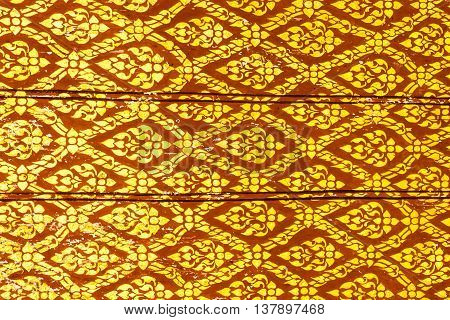 Thai art gold painting pattern on door Wat Thai in Thailand