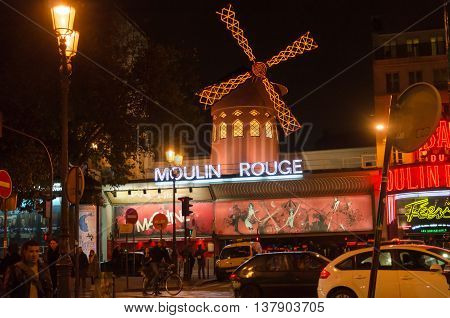 PARIS FRANCE - NOVEMBER 14 2013: The famous cabaret Moulin Rouge located close to Montmartre in the district of Pigalle on boulevard Clichy in the 18th arrondissement of Paris.