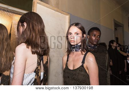 MILAN ITALY - JUNE 19: Beautiful models pose in the backstage just before Damir Doma SS 17 show during Milan Men's Fashion Week on JUNE 19 2016 in Milan.