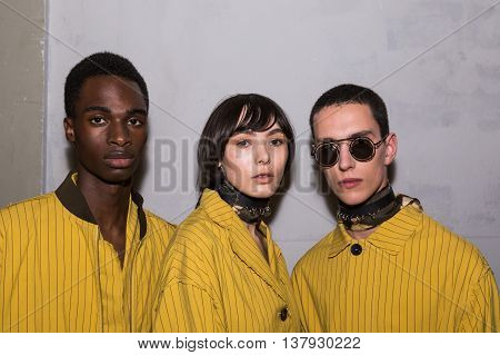 MILAN ITALY - JUNE 19: Beautiful models pose in the backstage just before Damir Doma SS 17 show during Milan Men's Fashion Week on JUNE 19 2016 in Milan.