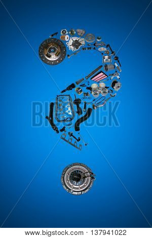 Question mark with auto parts for car. Auto parts for car. Auto parts for shop, aftermarket OEM. Question mark with auto parts. Many auto spare parts isolated in exclamation point