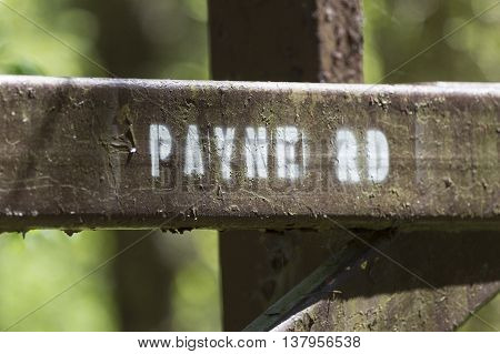 Roughly painted sign at access road in Freetown State Forest