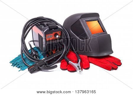 Inverter welding machine, welding equipment, isolated on a white background, welding mask, leather gloves, welding electrodes, high-voltage wires with clips, set of accessories for arc welding.