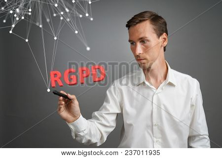 RGPD, Spanish, French and Italian version version of GDPR: Reglamento General de Proteccion de datos. General Data Protection Regulation. Young man working with information.