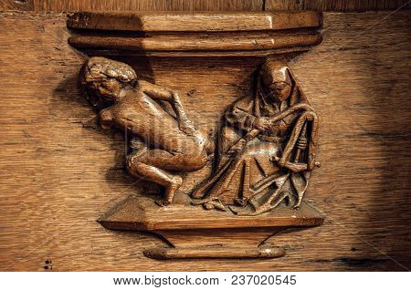 Amsterdam, Northern Netherlands, June 27, 2017. Weird Wooden Sculpture Of Naked Woman And Nun In Old