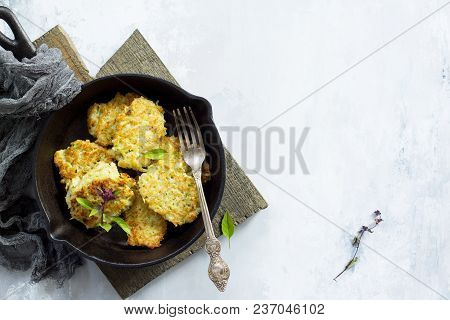Vegan Vegetable Fritters On A Background Of Gray Stone Or Slate. Fried Vegetarian Cutlets Or Pancake