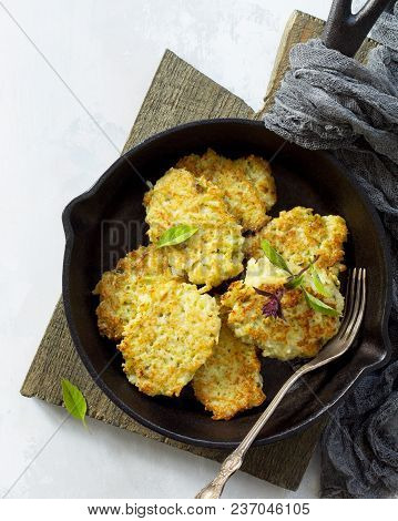 Vegan Vegetable Fritters On A Background Of Gray Stone Or Slate. Fried Vegetarian Cutlets Or Pancake