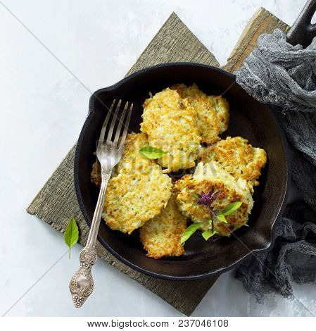 Vegan Vegetable Fritters On A Background Of Gray Stone Or Slate. Fried Vegetarian Cutlets Or Pancake