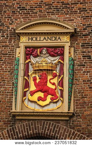 The Hague, Western Netherlands - June 29, 2017. Colorful And Golden Coat Of Arms From Royalty Decora