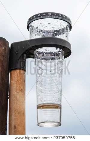 Meteorology With Rain Gauge In Garden