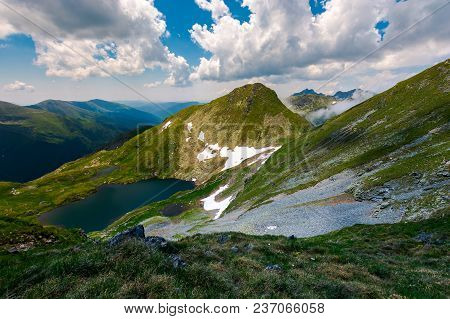 Saua Caprei Peak Of Fagarasan Mountains. Gorgeous Summer Landscape Of Southern Carpathians In Romani