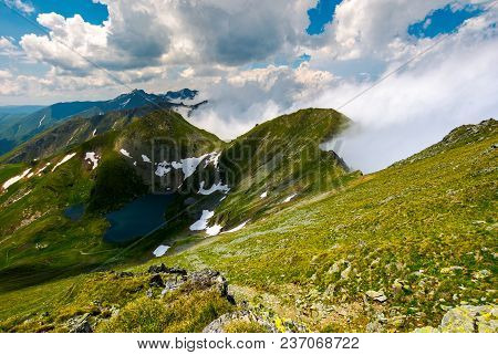 Lake Capra View From Saua Vaiuga. Beautiful Summer Landscape Of Fagarasan Mountains, Romania