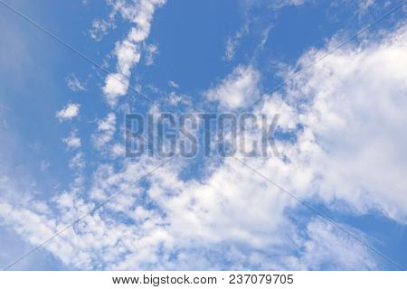 Beautiful Nature Blue Sky With Clouds, Sky Clouds Background, Cloudscape Concept. Space For Text In 