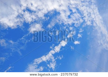 Beautiful Nature Blue Sky With Clouds, Sky Clouds Background, Cloudscape Concept. Space For Text In 