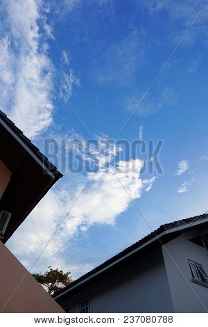 Looking Up Roof With Home On Blue Sky And Clouds, Beautiful Nature Blue Sky With Clouds, Cloudscape 