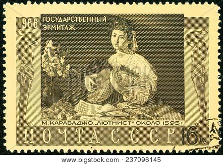 Ukraine - Circa 2018: A Postage Stamp Printed In Ussr Show Lute Player 1596 By Michelangelo Merisi D