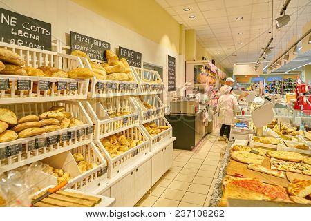 ROME, ITALY - CIRCA NOVEMBER 2017: stalls filled with bread are seen in Conad supermarket in Rome.