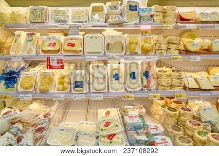 ROME, ITALY - CIRCA NOVEMBER 2017: cheese on display in Conad supermarket in Rome.