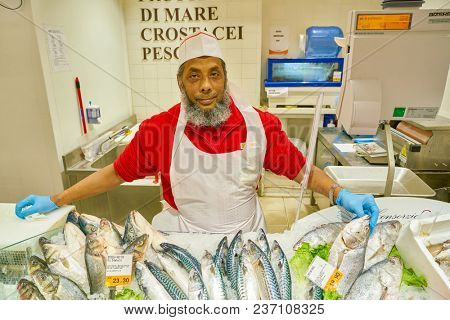 ROME, ITALY - CIRCA NOVEMBER 2017: indoor portrait of staff in Conad supermarket in Rome.