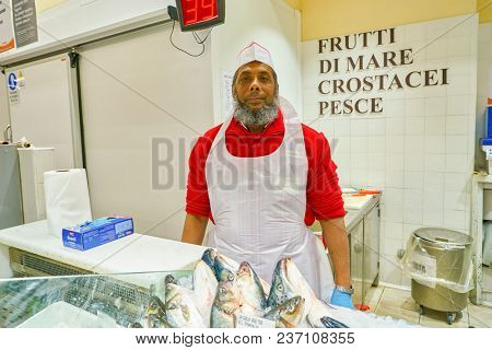 ROME, ITALY - CIRCA NOVEMBER 2017: indoor portrait of staff in Conad supermarket in Rome.