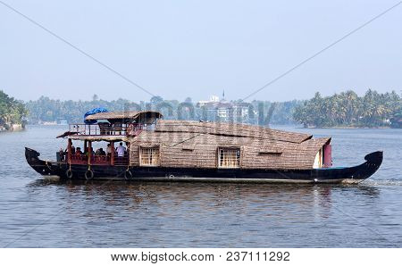 Alleppey, India - November 5, 2016: Tourists On Houseboat Floating On Backwaters In Kerala State, So