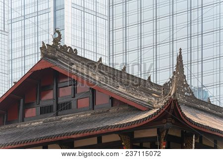 Daci Buddhist Temple Against Modern Building In Chengdu, China