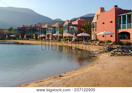 Taba, Egypt - November 20, 2013: Unknown People Rest On Beach Of Hyatt Regency Heights 5 * Hotel Nea