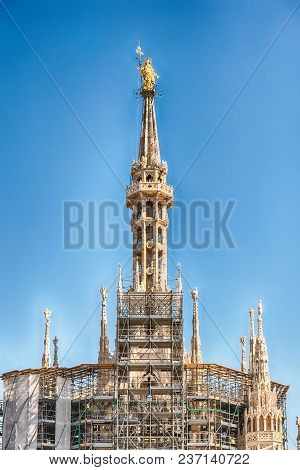 Golden Madonna Statue On Top Of Milan Cathedral, Italy