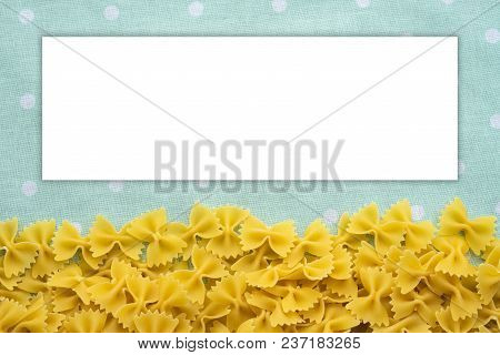 Farfalle Raw Farfallini Beautiful Decomposed Pasta From The Bottom On A Green Peas Texture. Close-up