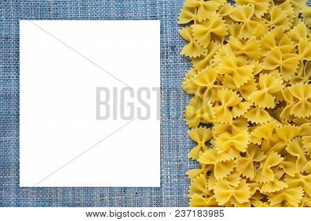 Farfalle Raw Farfallini Beautiful Decomposed Pasta With The Right, On Its Side On A Rustic Blue Knit