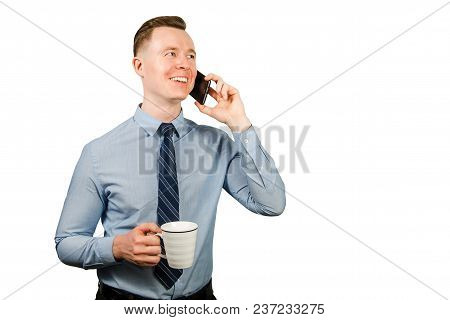 Young Businessman Dressed In Blue Shirt And Tie, Isolated On White Background
