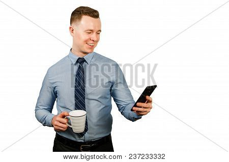 Young Businessman Dressed In Blue Shirt And Tie, Isolated On White Background