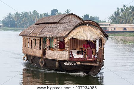 Alleppey, India - November 6, 2016: Tourists On Houseboat Floating On Backwaters In Kerala State