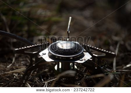 A Closeup Of A Boiling Pot On A Gas Primus Cooking Dinner For Hikers. Outdoors Kitchen.