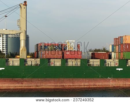Labuan,malaysia-april 6,2018:cargo Ship,full Of Shipping Containers In The Port Of Labuan,malaysia.i