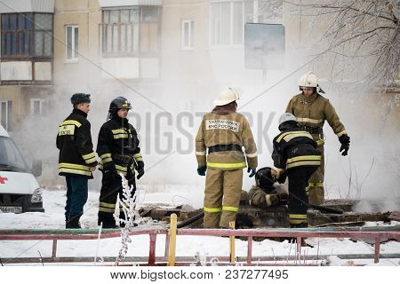 Kamensk-uralsky, Russia, February 10, 2018: Firefighters Eliminate The Source Of Fire On The Backgro