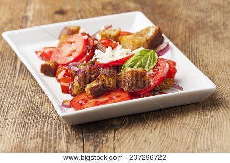 Italian Bread Salad With Tomatoes On Wood