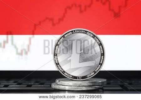 Litecoin (ltc) Cryptocurrency; Coin Litecoin On The Background Of The Flag Of Indonesia
