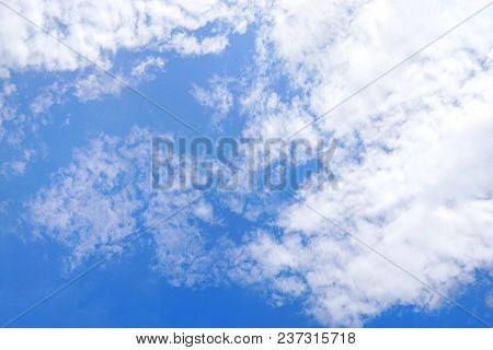 Beautiful Nature Blue Sky With Clouds, Sky Clouds Background, Cloudscape Concept. Space For Text In 