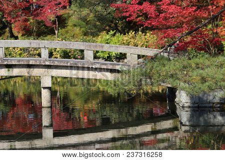 A Bridge At The Hojo Pond By The Eikando Zenrin-ji Temple In Kyoto, Japan
