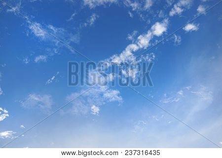 Beautiful Nature Blue Sky With Clouds, Sky Clouds Background, Cloudscape Concept. Space For Text In 