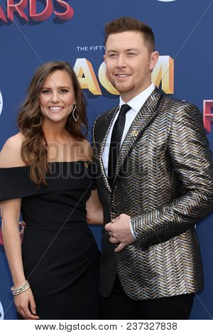 LAS VEGAS - APR 15:  Gabi Dugal, Scotty McCreery at the Academy of Country Music Awards 2018 at MGM Grand Garden Arena on April 15, 2018 in Las Vegas, NV