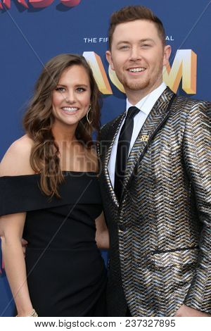 LAS VEGAS - APR 15:  Gabi Dugal, Scotty McCreery at the Academy of Country Music Awards 2018 at MGM Grand Garden Arena on April 15, 2018 in Las Vegas, NV