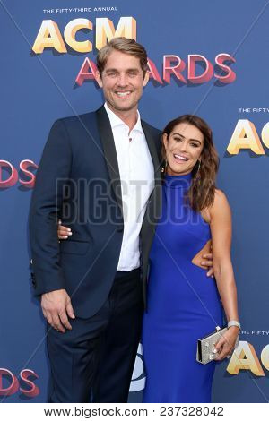LAS VEGAS - APR 15:  Brett Young, Taylor Mills at the Academy of Country Music Awards 2018 at MGM Grand Garden Arena on April 15, 2018 in Las Vegas, NV