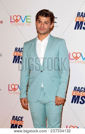 LOS ANGELES - APR 20:  Garrett Clayton at the 25th Annual Race To Erase MS Gala on the Beverly Hilton Hotel on April 20, 2018 in Beverly Hills, CA