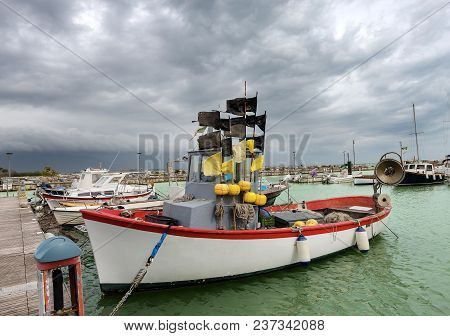 Small Fishing Boat Moored In The Port Of Bocca Di Magra Village, Liguria, Italy, Europe