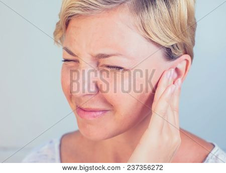 Young Female Having Ear Pain Touching Her Painful Head Earache