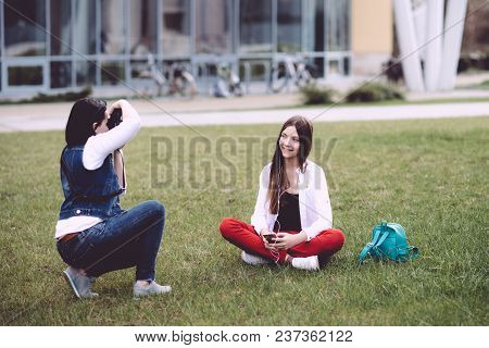 A Professional Photographer Performs His Work