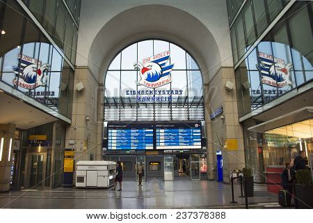 German People And Foreigner Travelers Walk And Waiting Train In Terminal At Mannheim Hauptbahnhof Ra