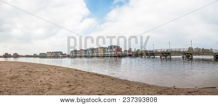 In The Town Of Houten, These Beautifully Painted Houses Are On The Water
